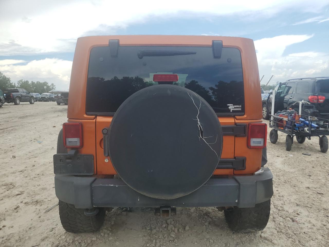 2011 Jeep Wrangler Unlimited Sahara VIN: 1J4BA5H14BL558199 Lot: 69256695