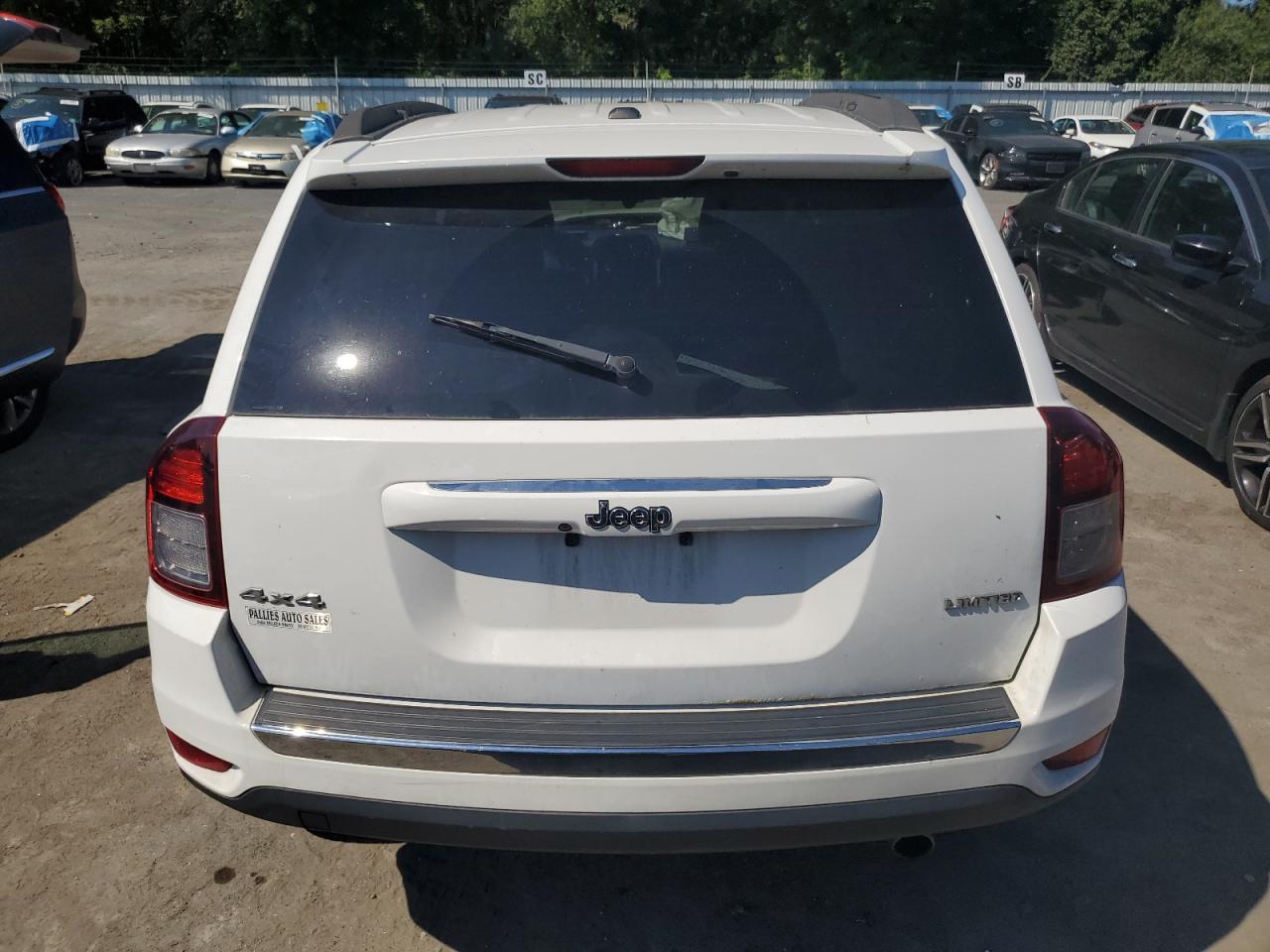 2014 Jeep Compass Limited VIN: 1C4NJDCB8ED617735 Lot: 69936115
