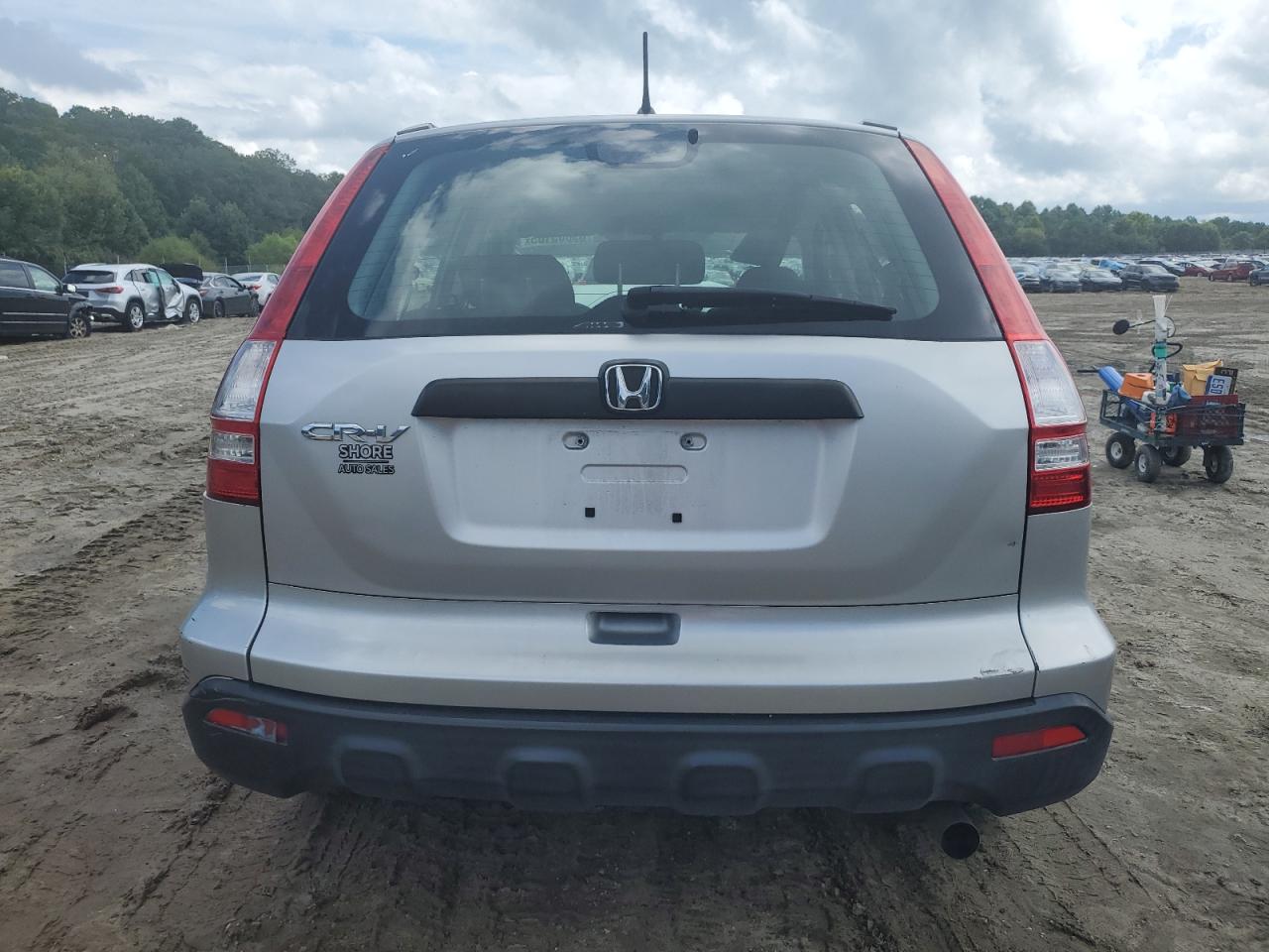 2009 Honda Cr-V Lx VIN: JHLRE48339C016447 Lot: 69805105