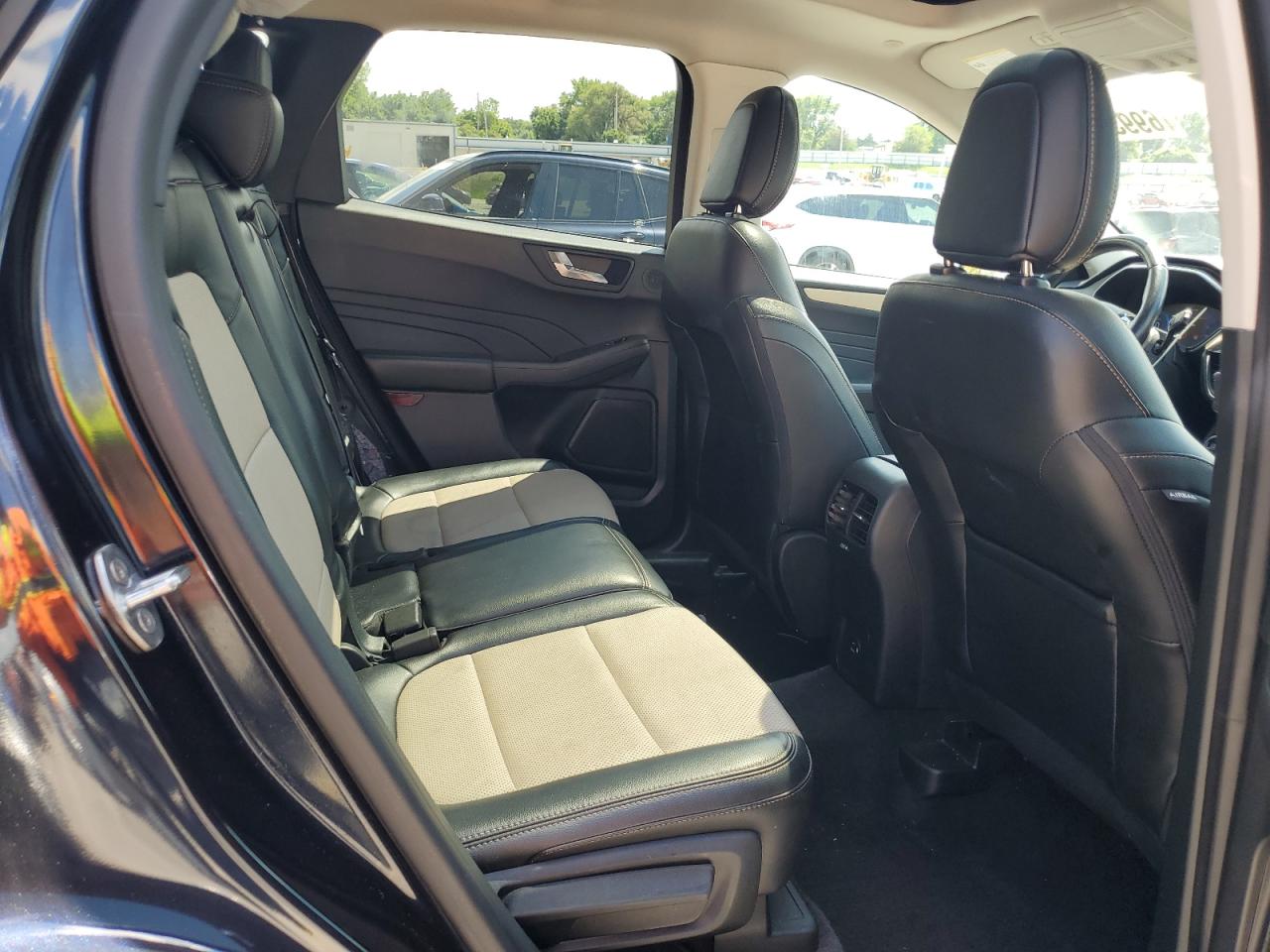 2021 Ford Escape Titanium VIN: 1FMCU9J91MUA70166 Lot: 69936185