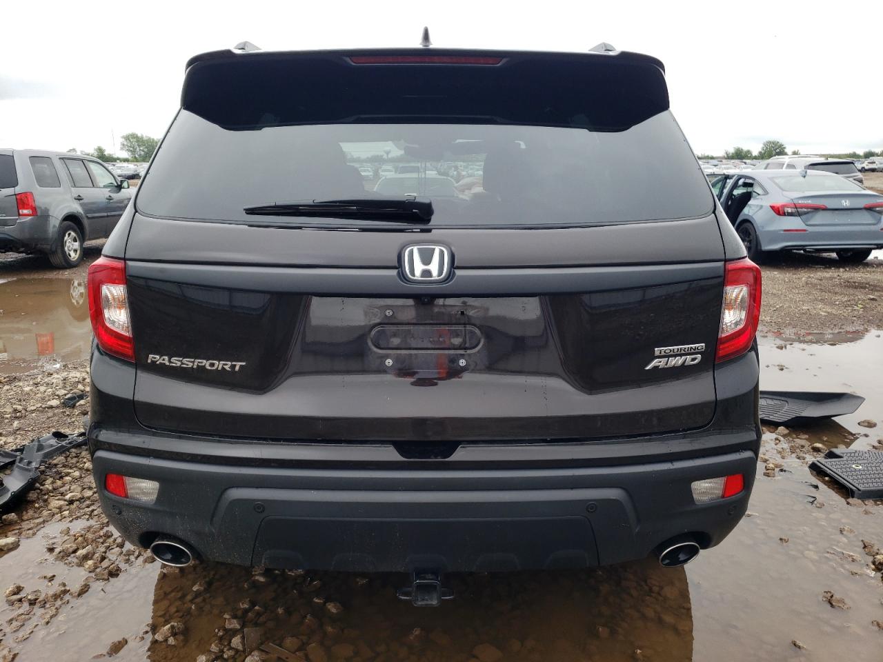 2021 Honda Passport Touring VIN: 5FNYF8H90MB008190 Lot: 69515475
