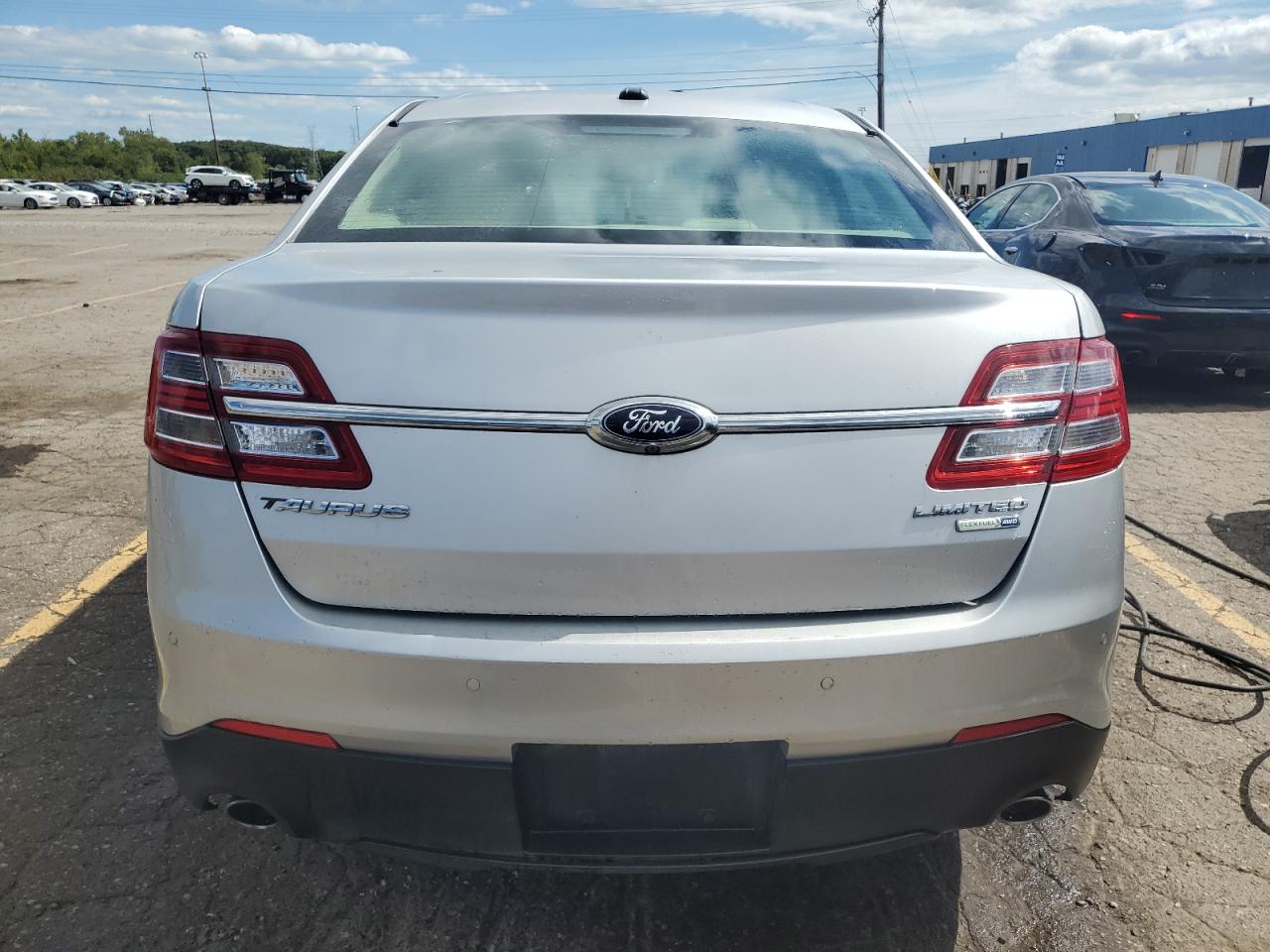 2016 Ford Taurus Limited VIN: 1FAHP2J83GG106934 Lot: 71072185