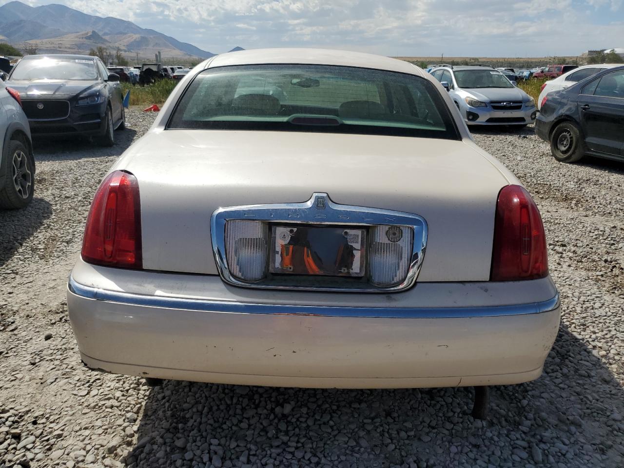 1998 Lincoln Town Car Cartier VIN: 1LNFM83WXWY733028 Lot: 69767235