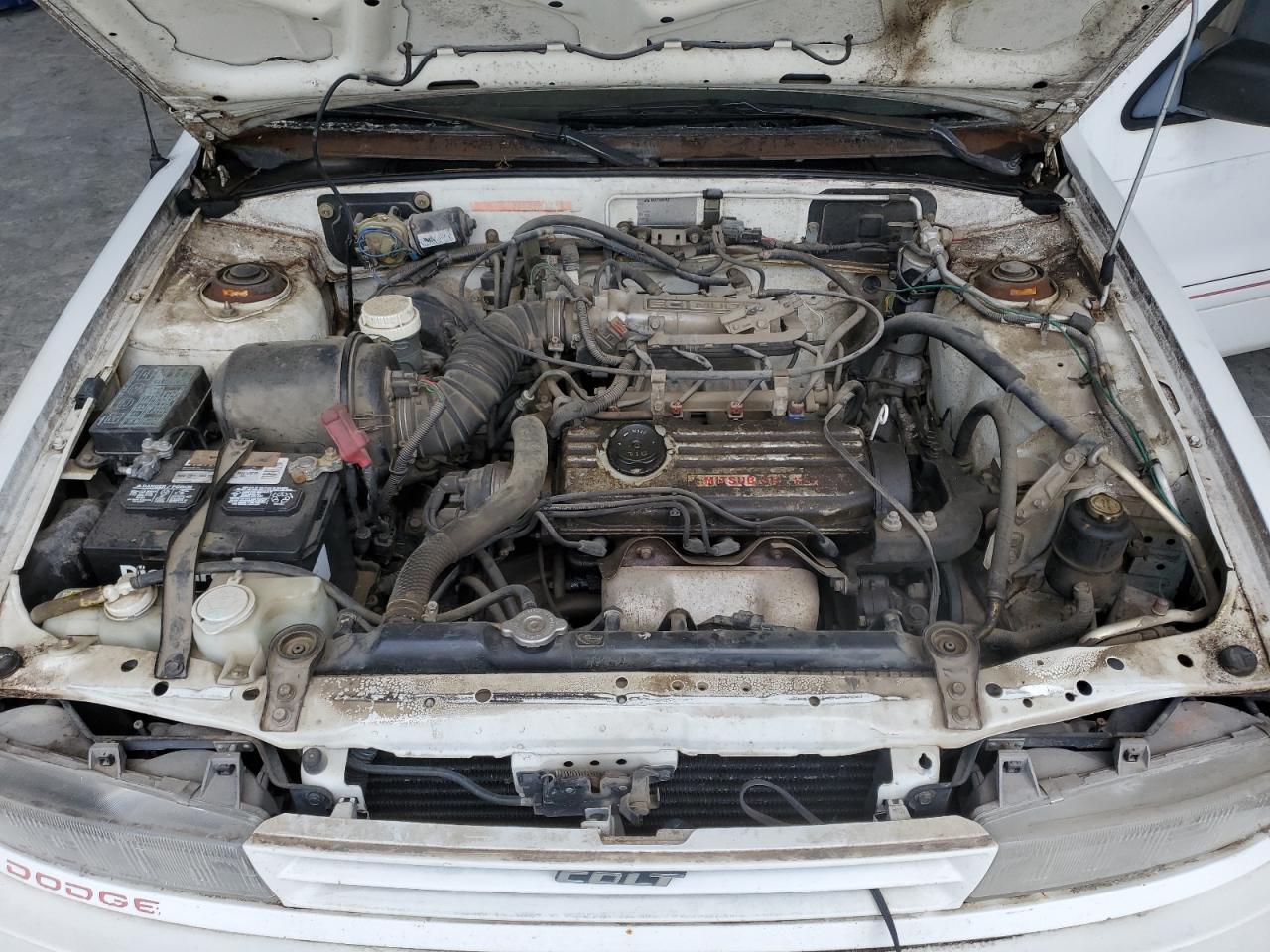 1992 Dodge Colt Gl VIN: JB3CU24A0NU057736 Lot: 66577285