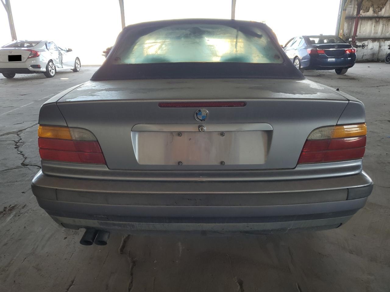 1994 BMW 325 Ic VIN: WBABJ5327RJC79003 Lot: 67675105