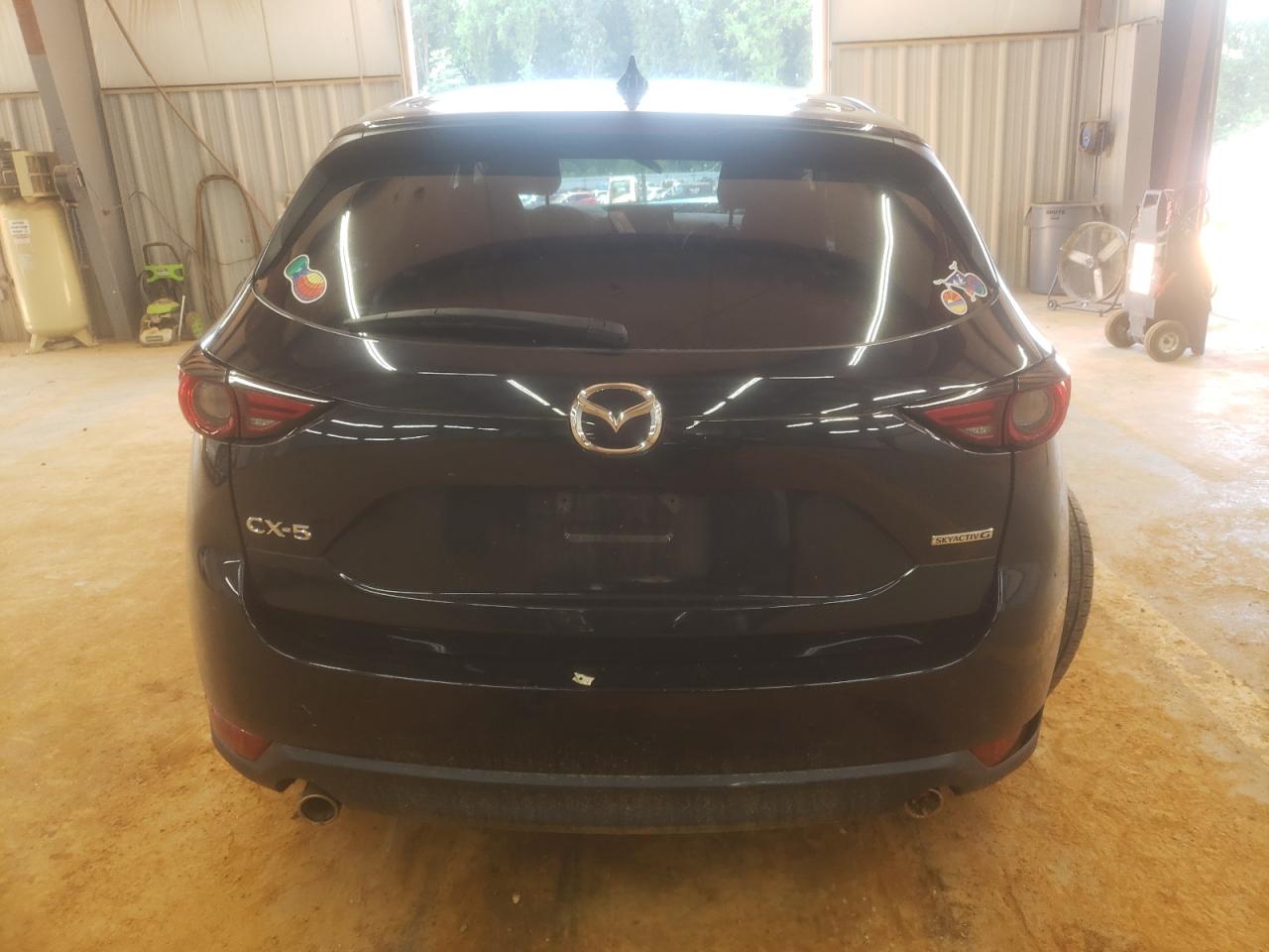 2021 Mazda Cx-5 Grand Touring VIN: JM3KFADM4M0402613 Lot: 71965245