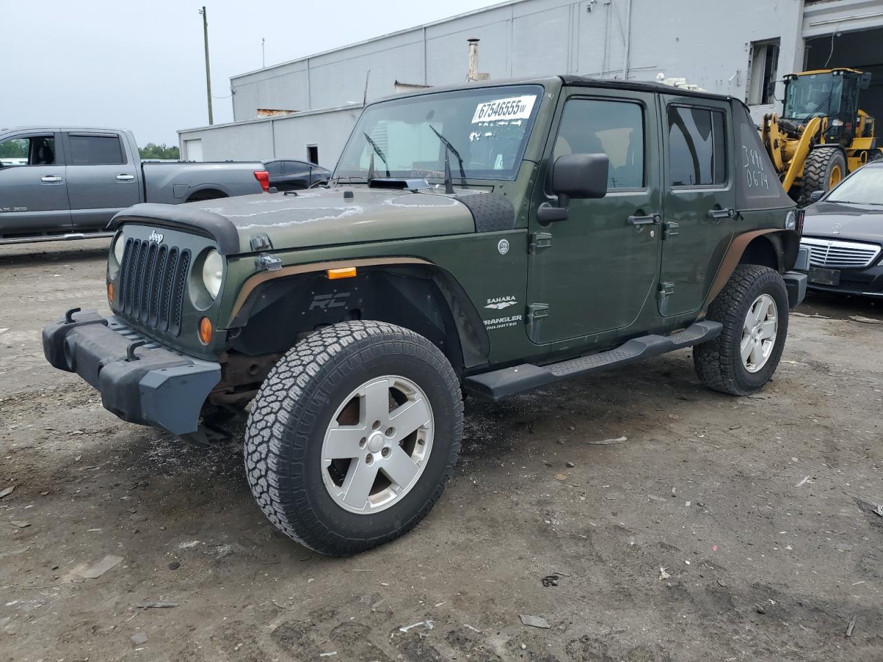 2007 Jeep Wrangler Sahara green null gas 1J4GA59197L161289 photo #1