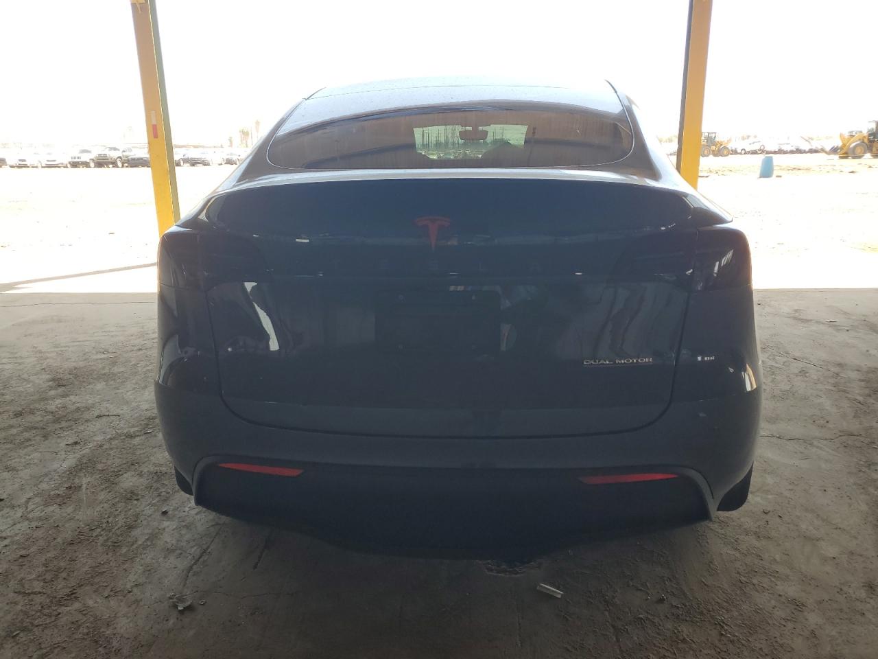 2023 Tesla Model Y VIN: 7SAYGDEF0PA049584 Lot: 69508355