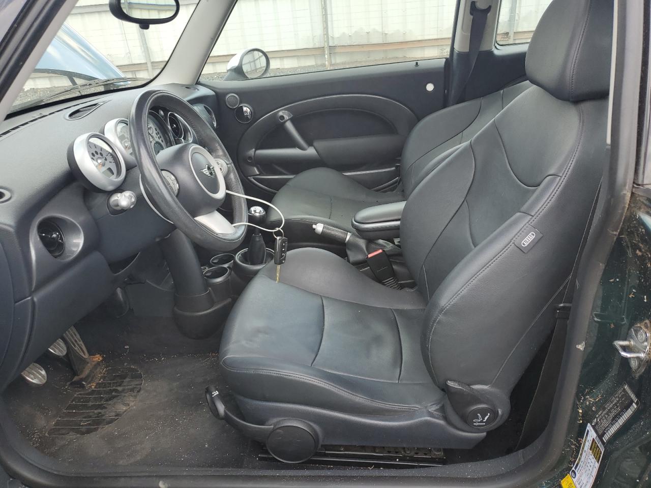 2006 Mini Cooper S VIN: WMWRE33576TL17411 Lot: 70922505