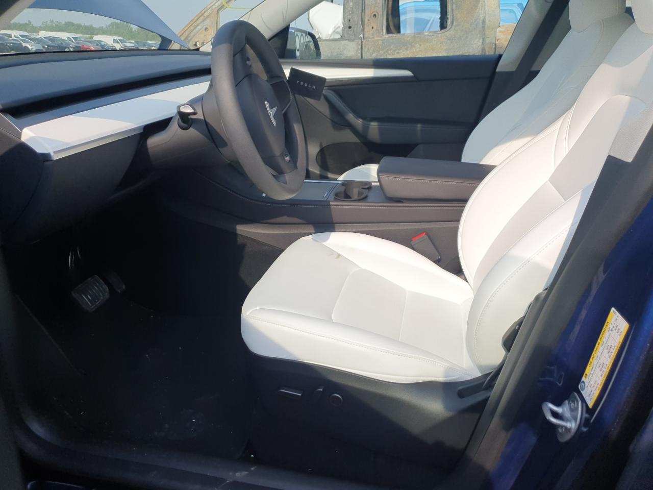 2024 Tesla Model Y VIN: 7SAYGAEE7RF981874 Lot: 65233805