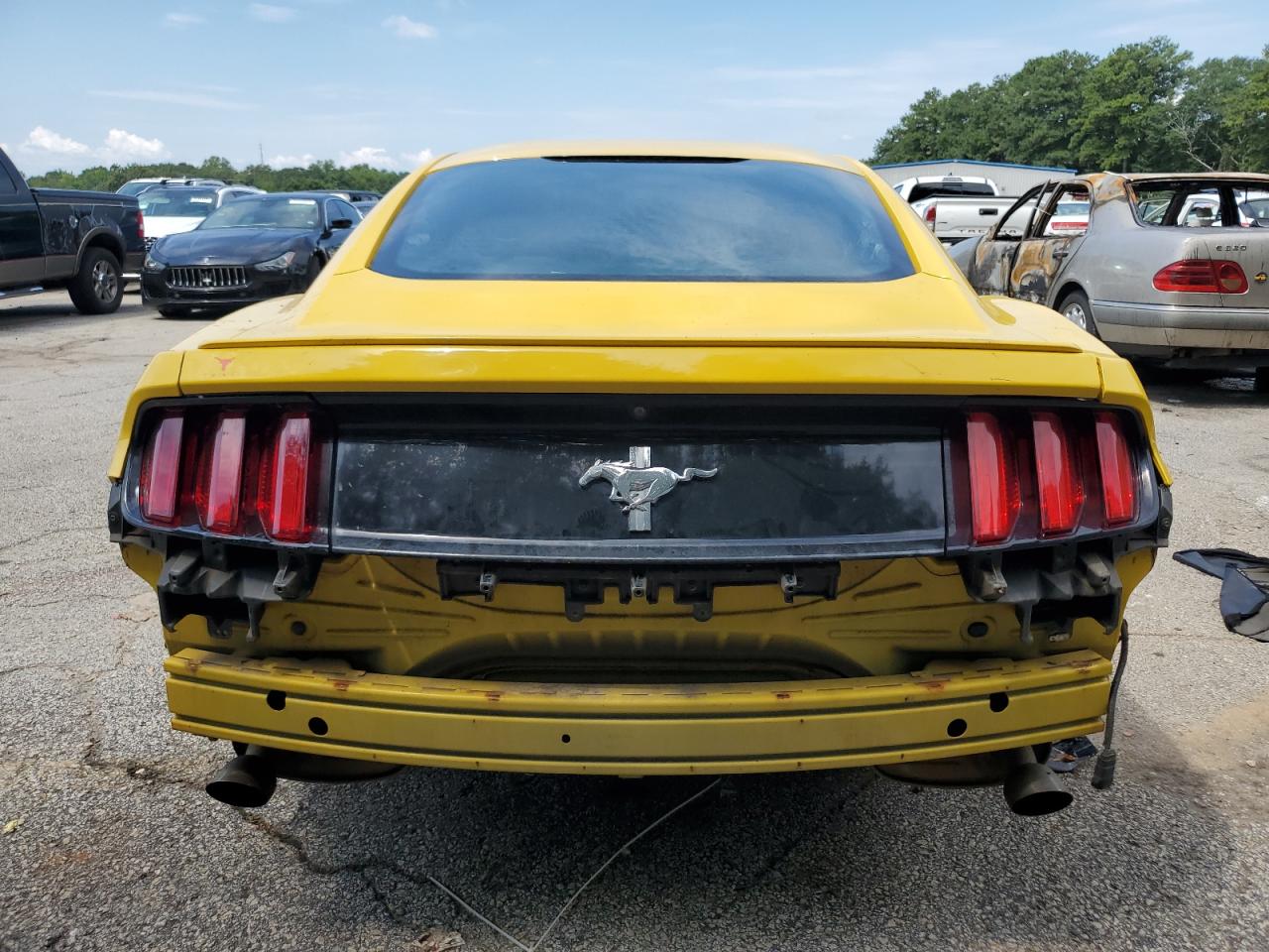 2016 Ford Mustang VIN: 1FA6P8AM9G5282065 Lot: 69702105