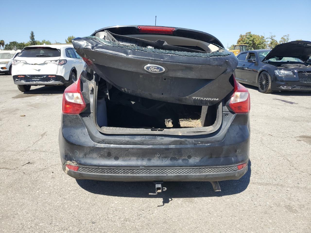 2012 Ford Focus Titanium VIN: 1FAHP3N27CL290241 Lot: 68192255