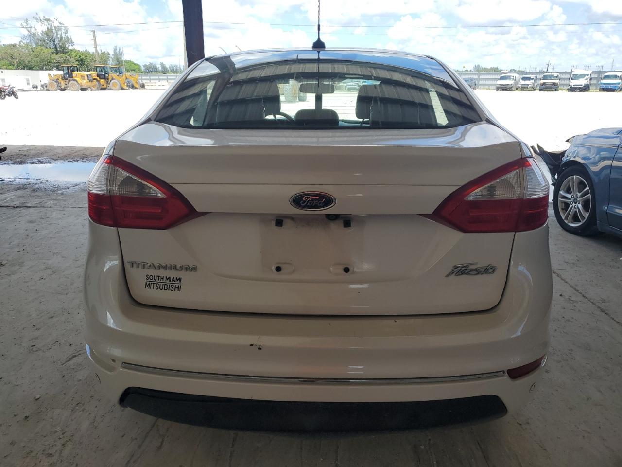 2016 Ford Fiesta Titanium VIN: 3FADP4CJ4GM193842 Lot: 67262135