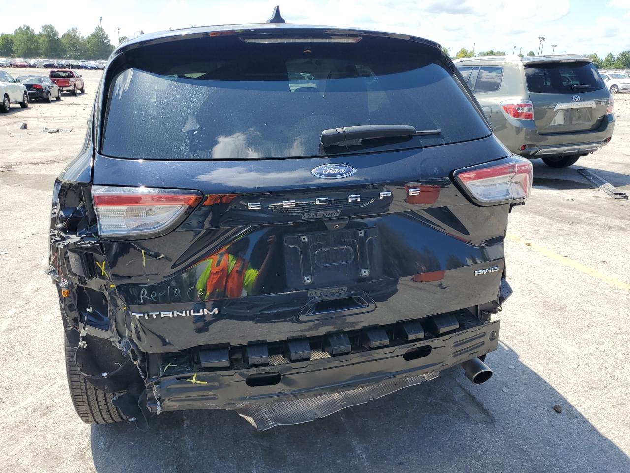 2021 Ford Escape Titanium VIN: 1FMCU9J91MUA70166 Lot: 69936185