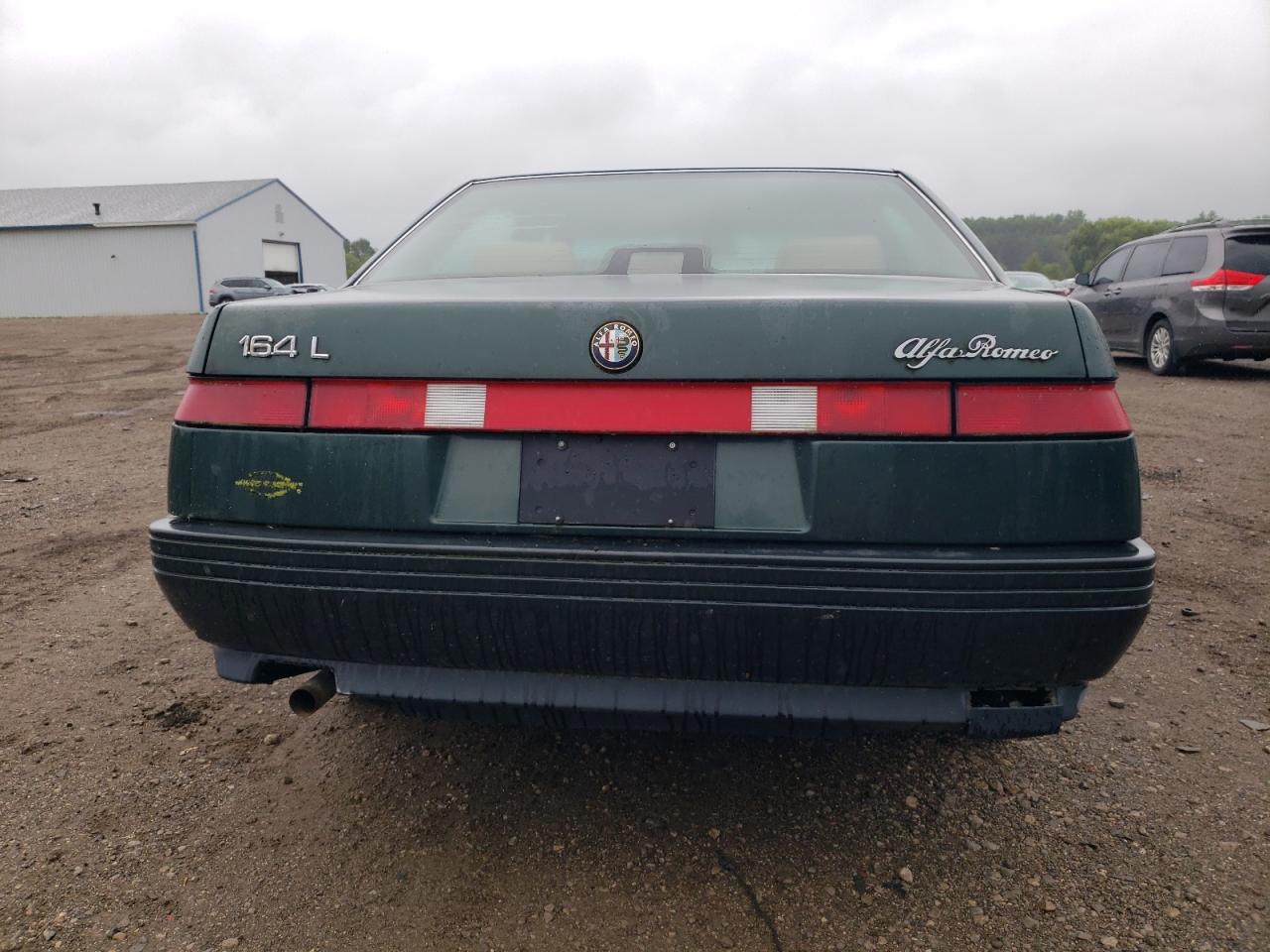 1991 Alfa Romeo 164 L VIN: ZAREA33L9M6207778 Lot: 69521875