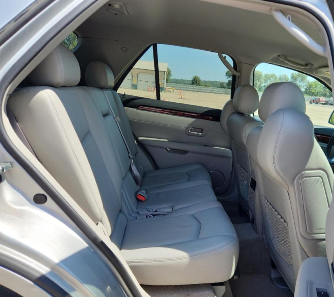 2009 Cadillac Srx VIN: 1GYEE637590107989 Lot: 70692915