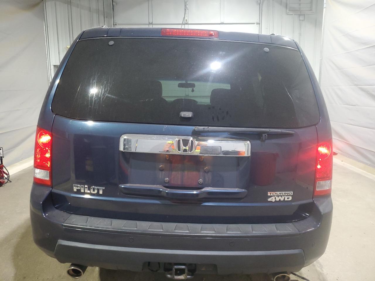 2010 Honda Pilot Touring VIN: 5FNYF4H98AB020849 Lot: 68003495