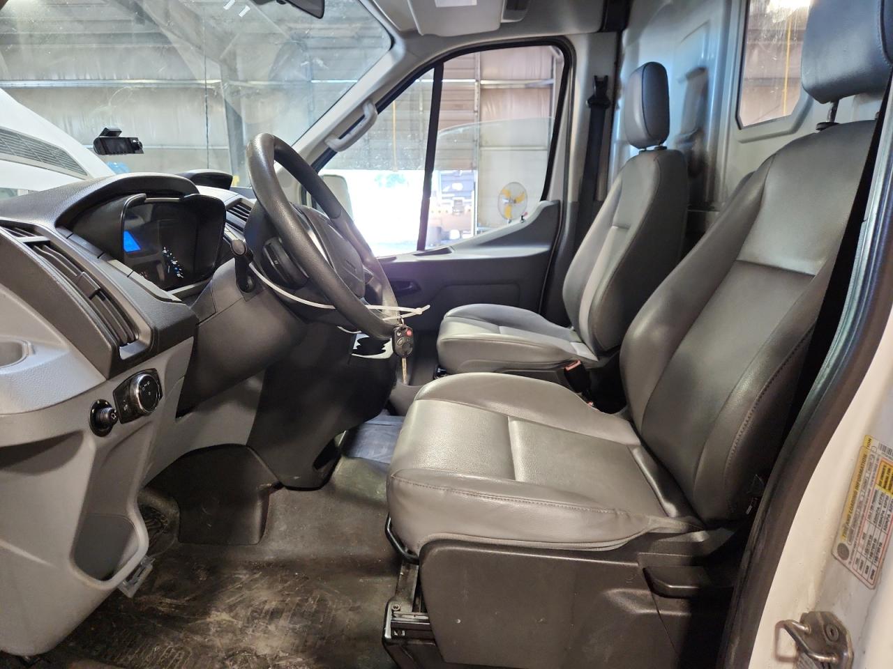2015 Ford Transit Cargo Van T- VIN: 1FTSF4XG2FKB16282 Lot: 69834195