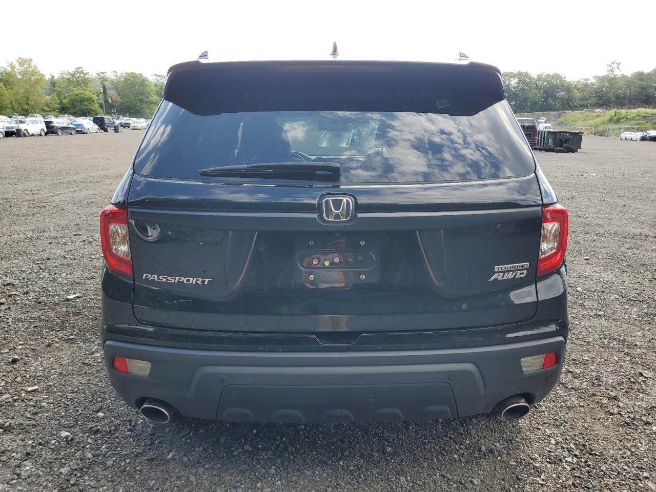 2019 Honda Passport Touring VIN: 5FNYF8H98KB006376 Lot: 69685155