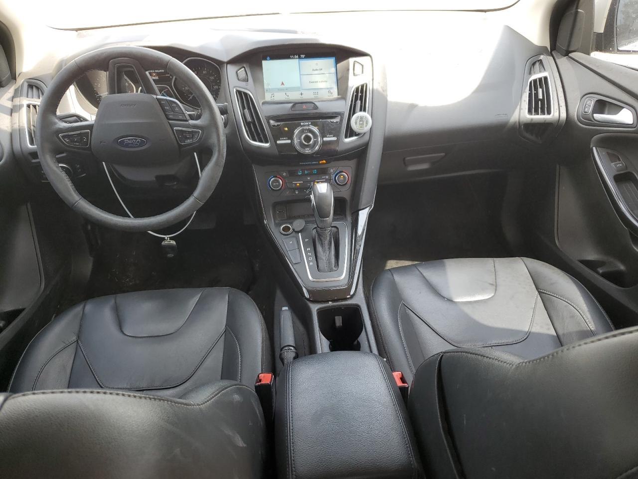 2017 Ford Focus Titanium VIN: 1FADP3J26HL331812 Lot: 67916645