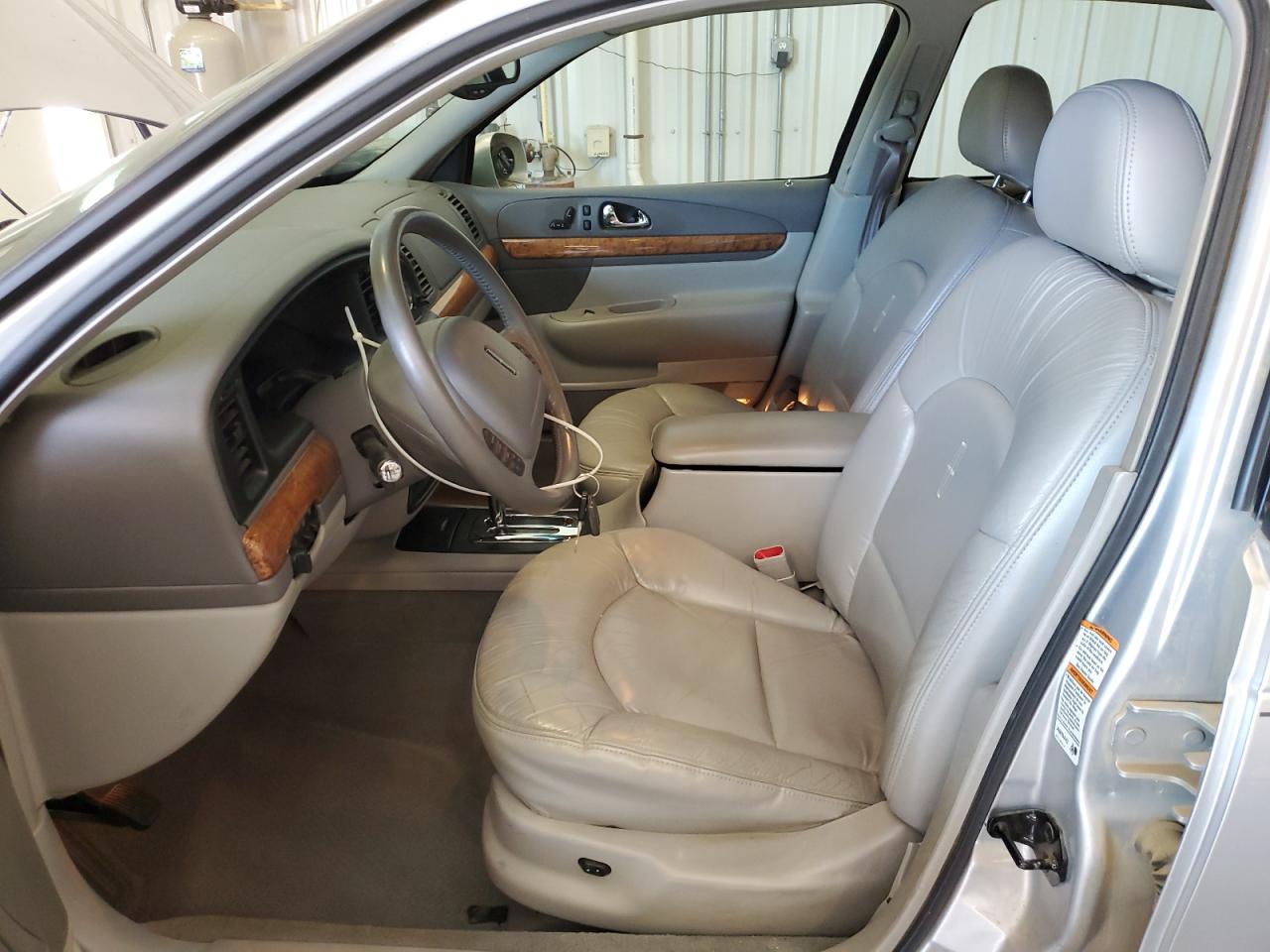 2000 Lincoln Continental VIN: 1LNHM97VXYY840387 Lot: 69805755