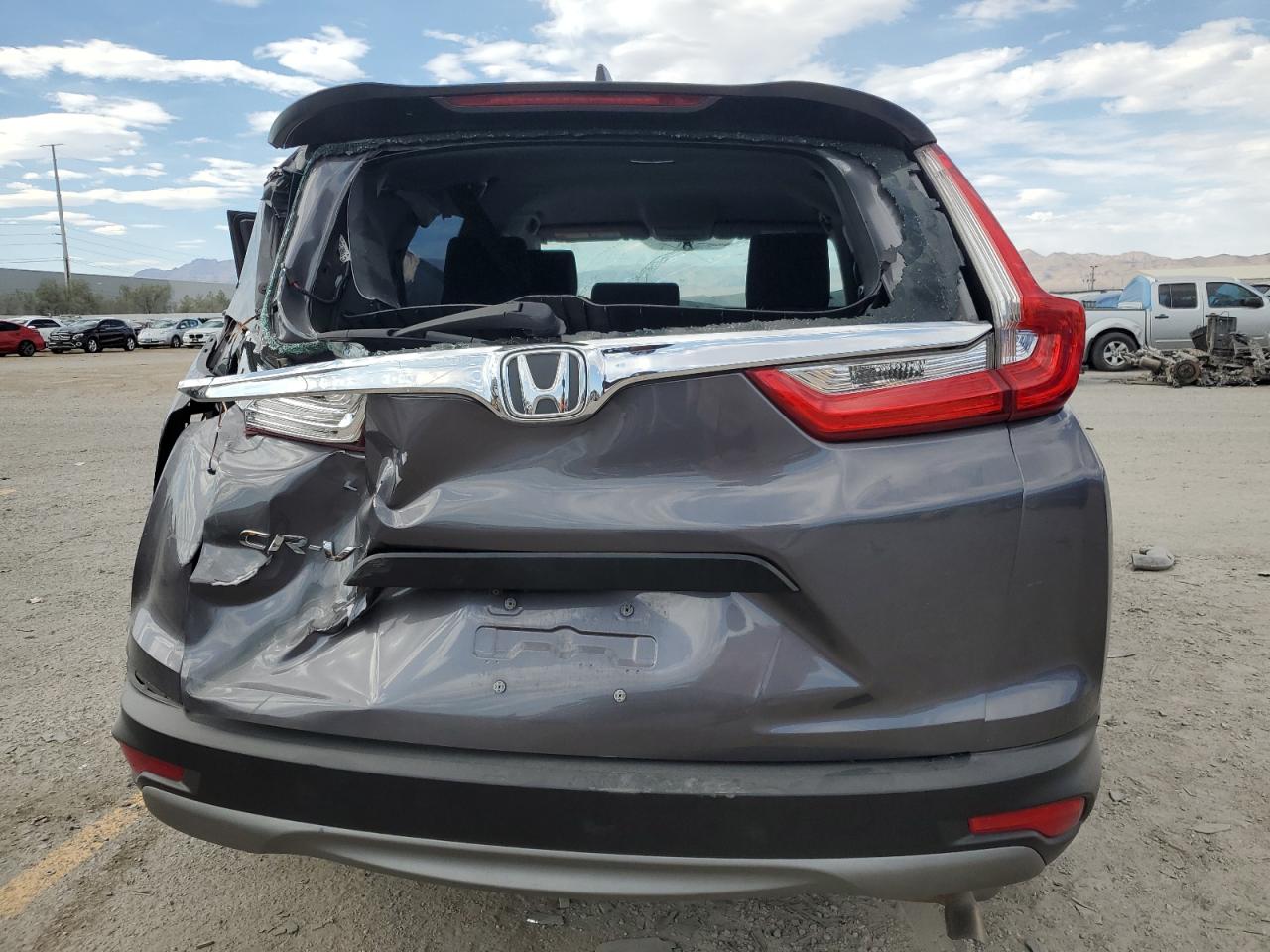 2019 Honda Cr-V Lx VIN: 2HKRW5H36KH406307 Lot: 70130885