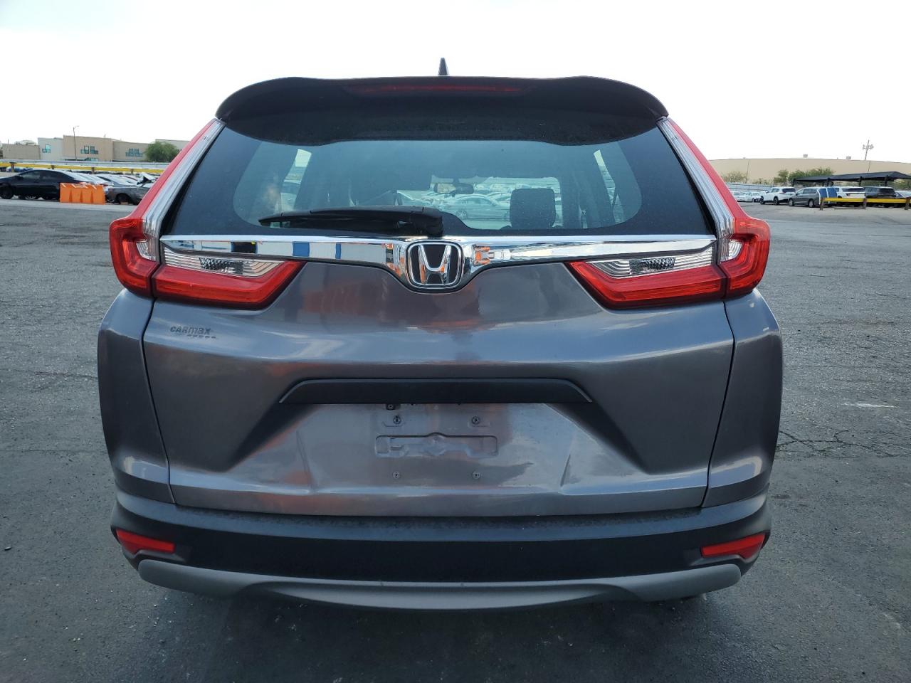 2019 Honda Cr-V Lx VIN: 2HKRW5H30KH406111 Lot: 70518925