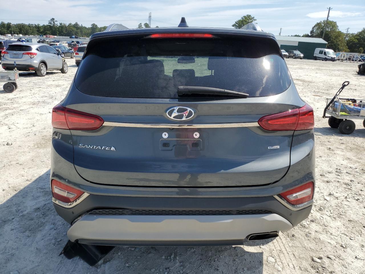 2020 Hyundai Santa Fe Limited VIN: 5NMS5CADXLH257099 Lot: 70456495