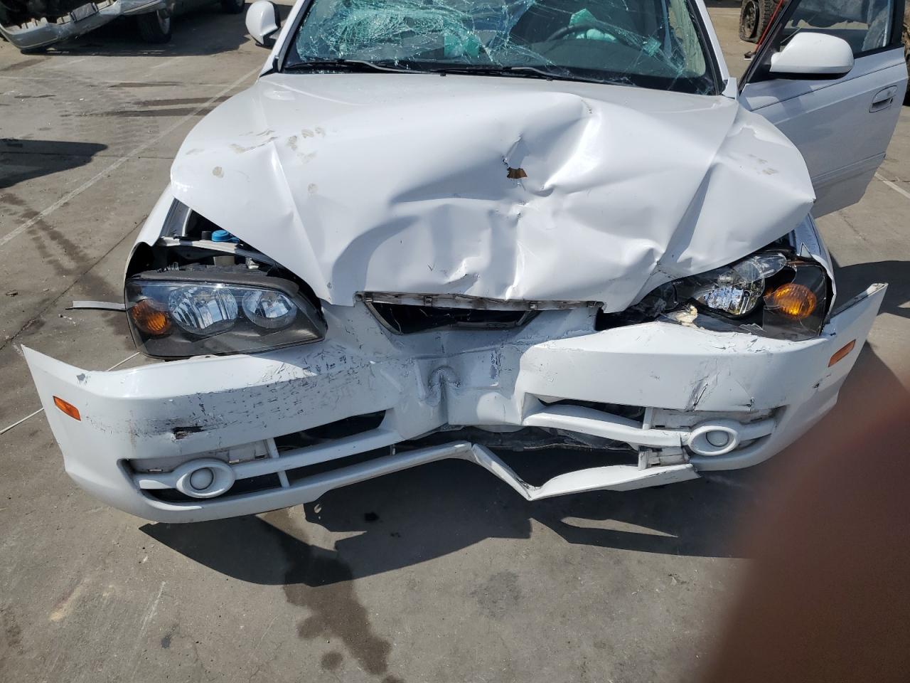 2005 Hyundai Elantra Gls VIN: KMHDN46DX5U938894 Lot: 70988345