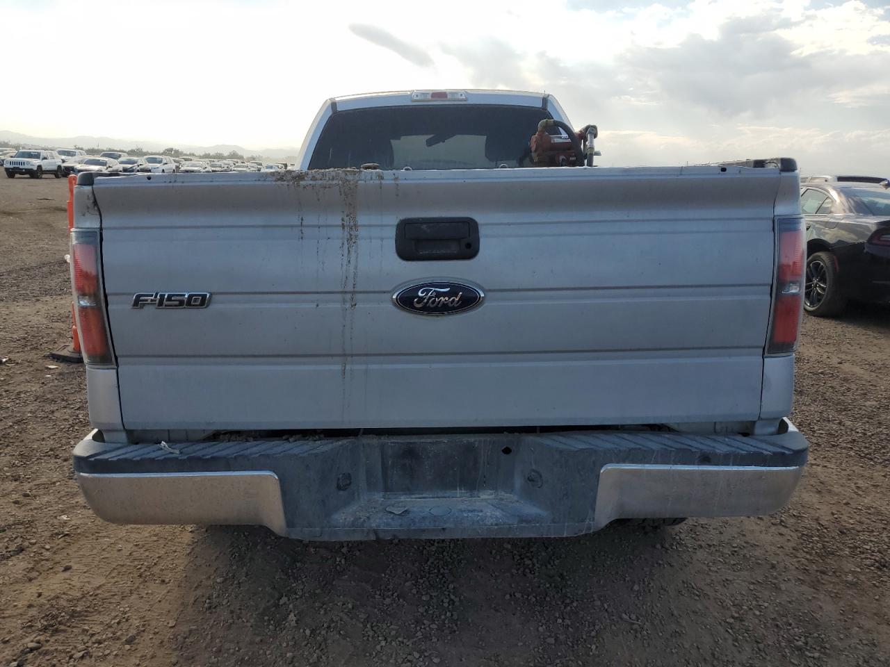 2013 Ford F150 VIN: 1FTMF1EM9DKE99327 Lot: 69840555