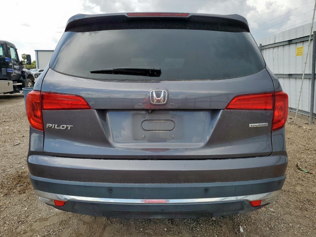 2017 Honda Pilot Touring VIN: 5FNYF5H99HB006569 Lot: 70750315