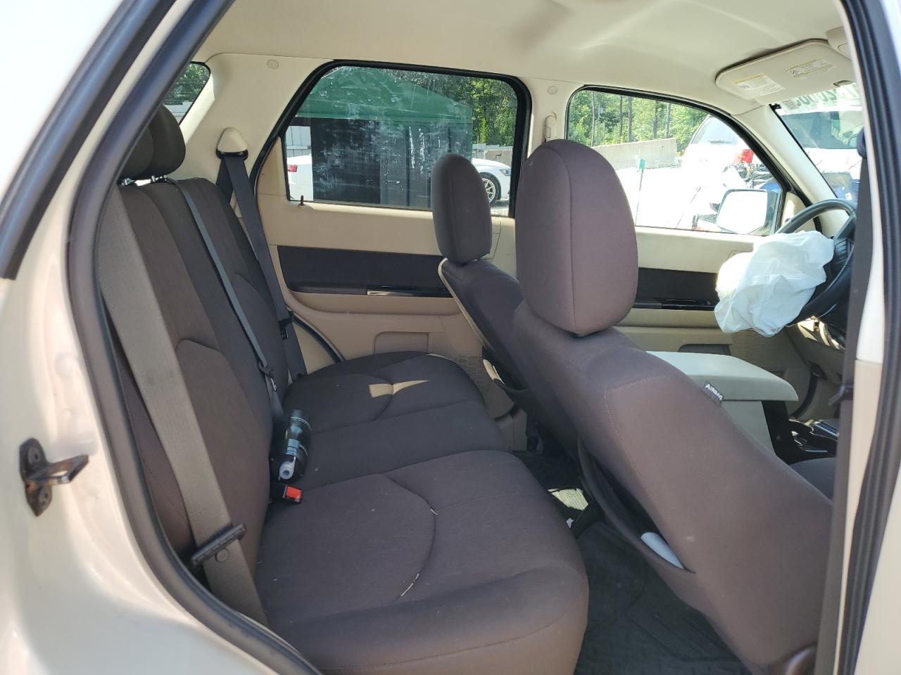 2009 Mazda Tribute I VIN: 4F2CZ02729KM01869 Lot: 67520685