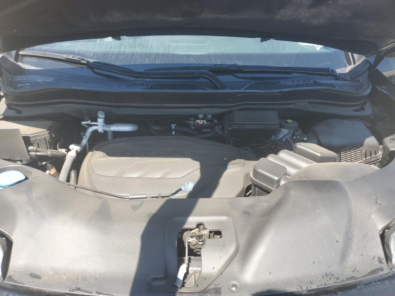 2021 Honda Passport Touring VIN: 5FNYF7H92MB004586 Lot: 70409535