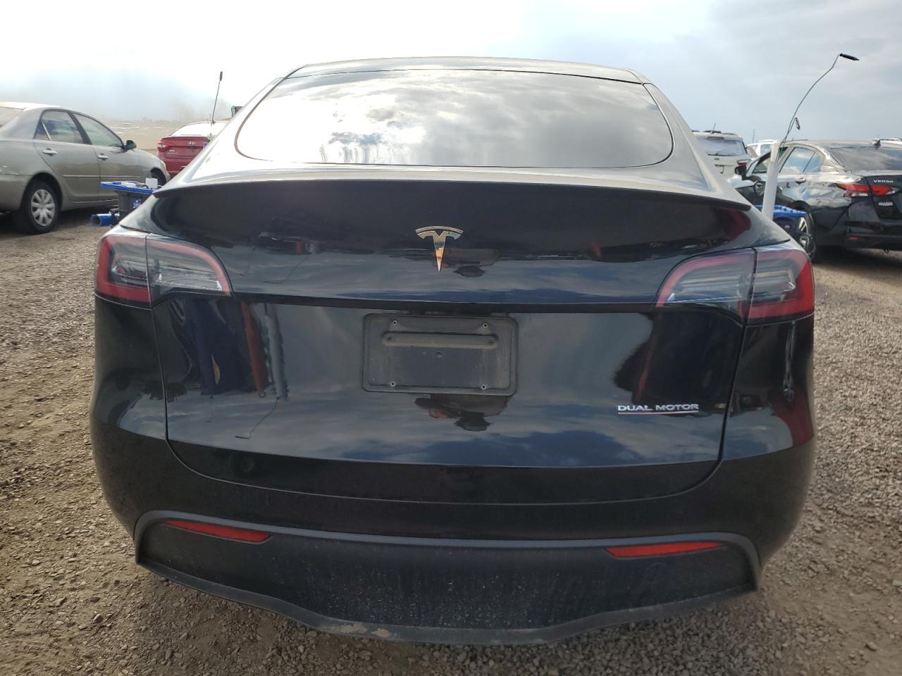 2023 Tesla Model Y VIN: 7SAYGDEF3PF617507 Lot: 71002645
