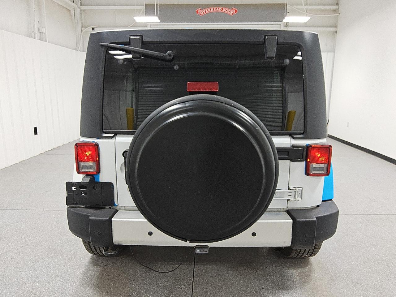 2014 Jeep Wrangler Unlimited Sahara VIN: 1C4BJWEG9EL206986 Lot: 65411765