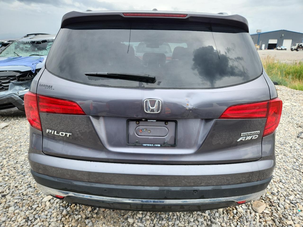 2017 Honda Pilot Touring VIN: 5FNYF6H90HB049168 Lot: 69983165