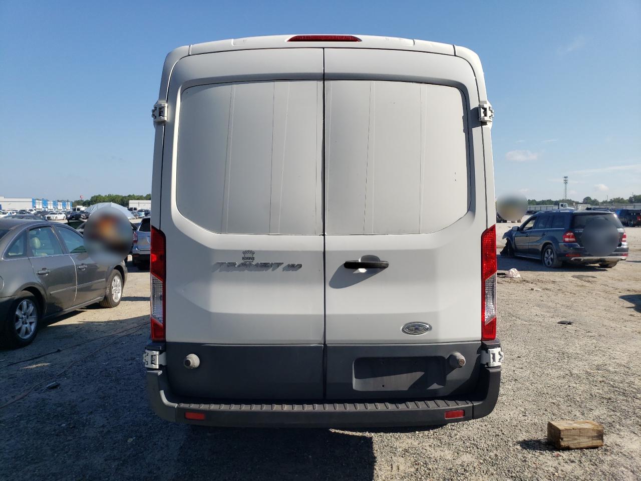 2015 Ford Transit T-150 VIN: 1FTNE2CM7FKA08773 Lot: 69261025