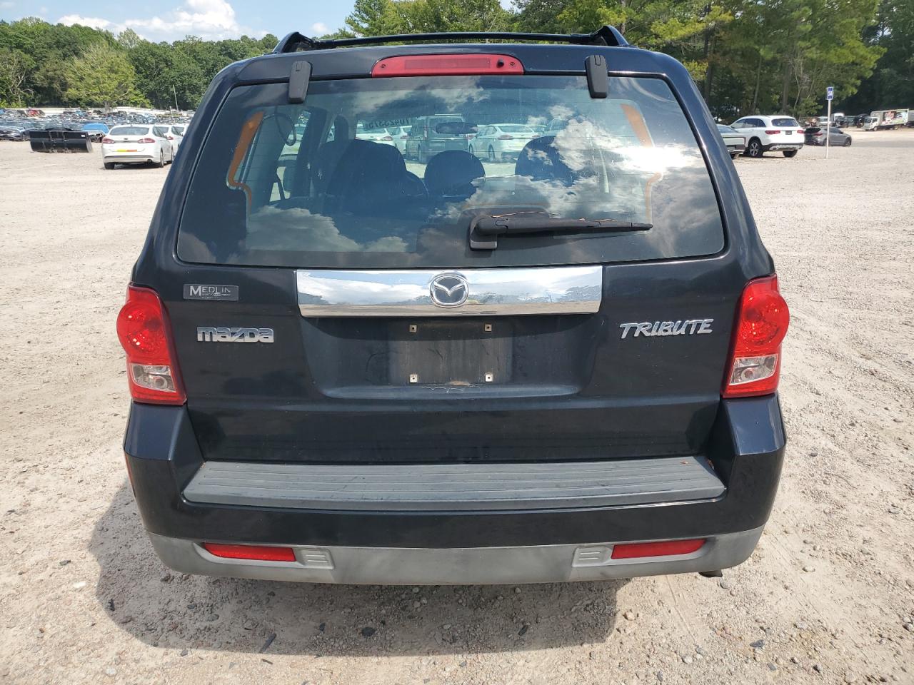 2009 Mazda Tribute I VIN: 4F2CZ02759KM07164 Lot: 70423375