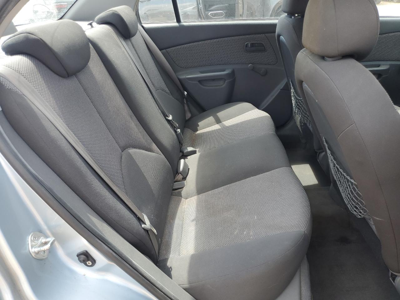 2009 Kia Rio Base VIN: KNADE223996441851 Lot: 67543075