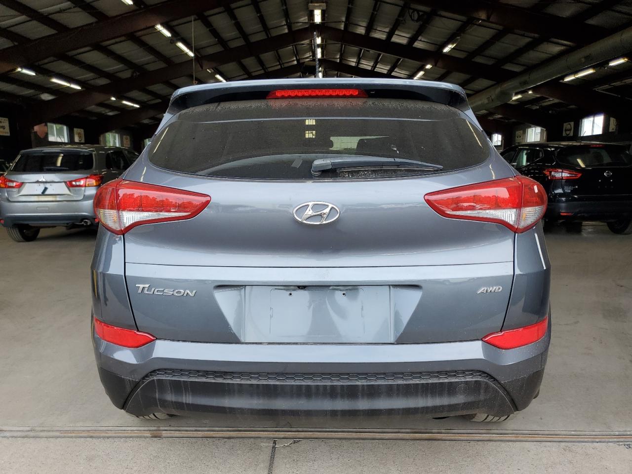 KM8J3CA46GU122200 2016 Hyundai Tucson Limited