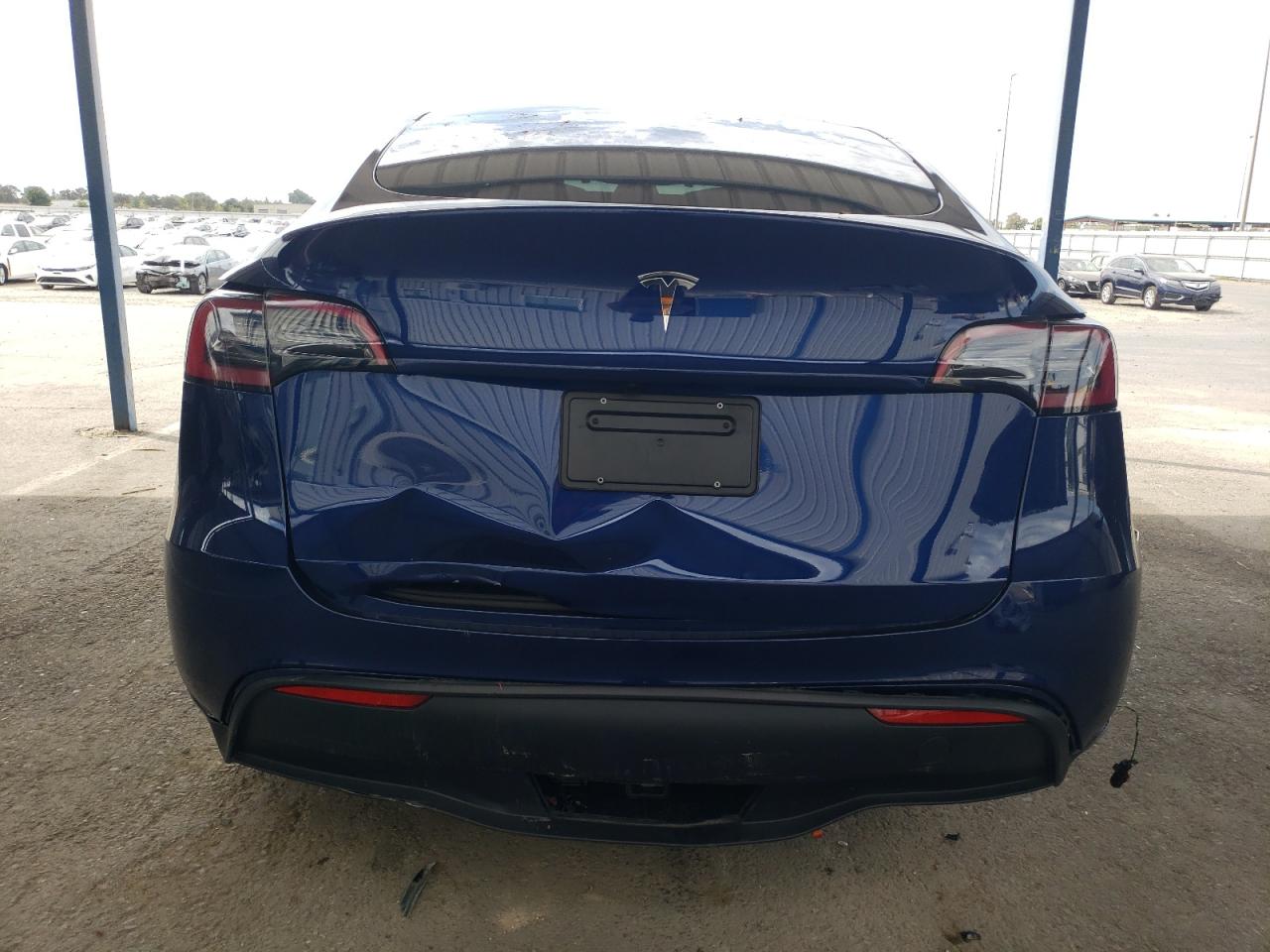 2025 Tesla Model Y VIN: 7SAYGDED9SF246277 Lot: 70370495