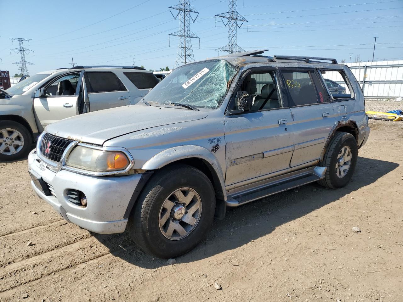 JA4MT41R71P055710 MITSUBISHI MONTERO Photo 1