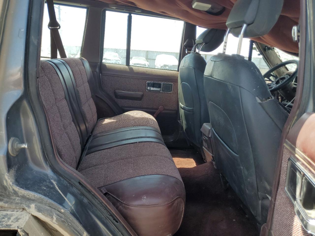 1990 Jeep Cherokee Laredo VIN: 1J4FJ58L8LL265166 Lot: 68045525