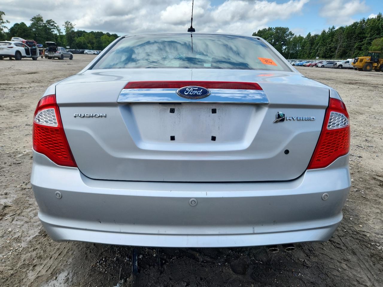 2010 Ford Fusion Hybrid VIN: 3FADP0L39AR230999 Lot: 69572015