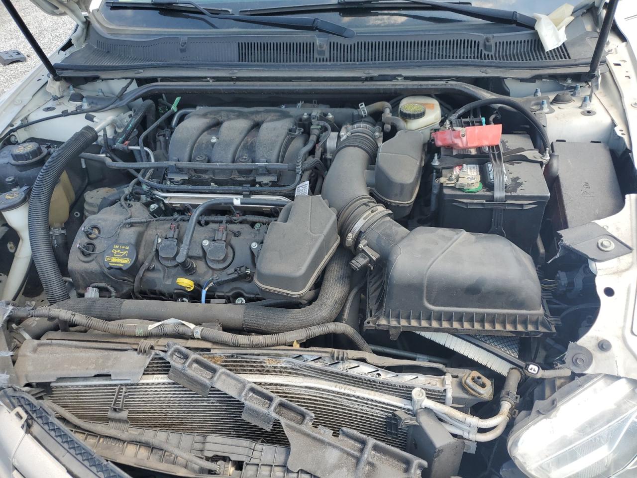 2014 Ford Taurus Sel VIN: 1FAHP2E83EG128536 Lot: 69189355