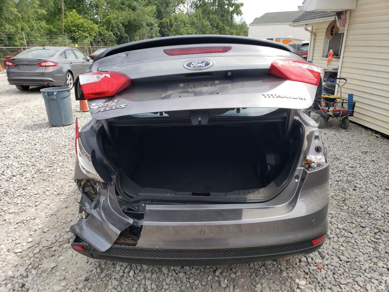 2014 Ford Focus Titanium VIN: 1FADP3J27EL205504 Lot: 97222515