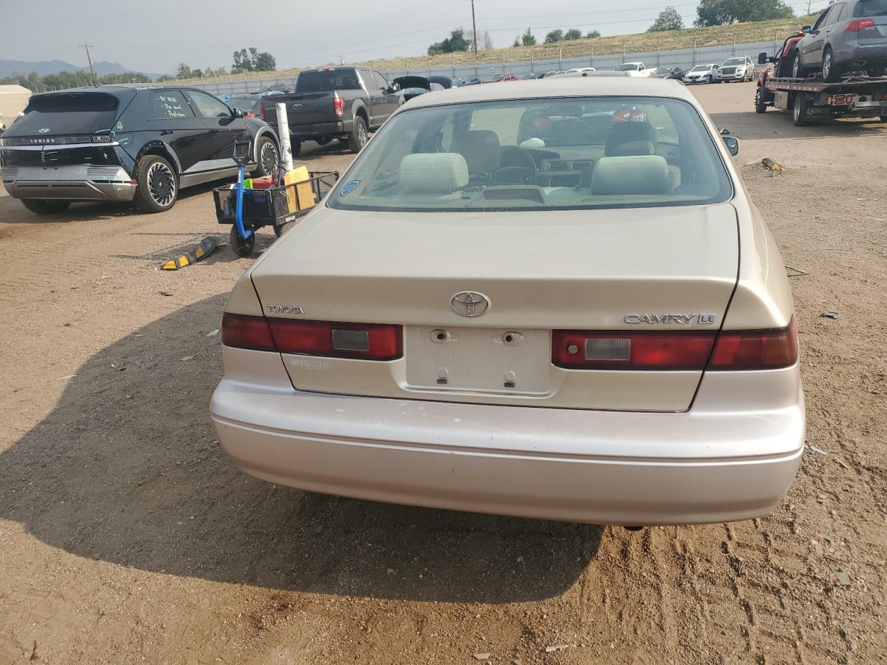 1999 Toyota Camry Le VIN: JT2BG28K1X0325183 Lot: 67929535