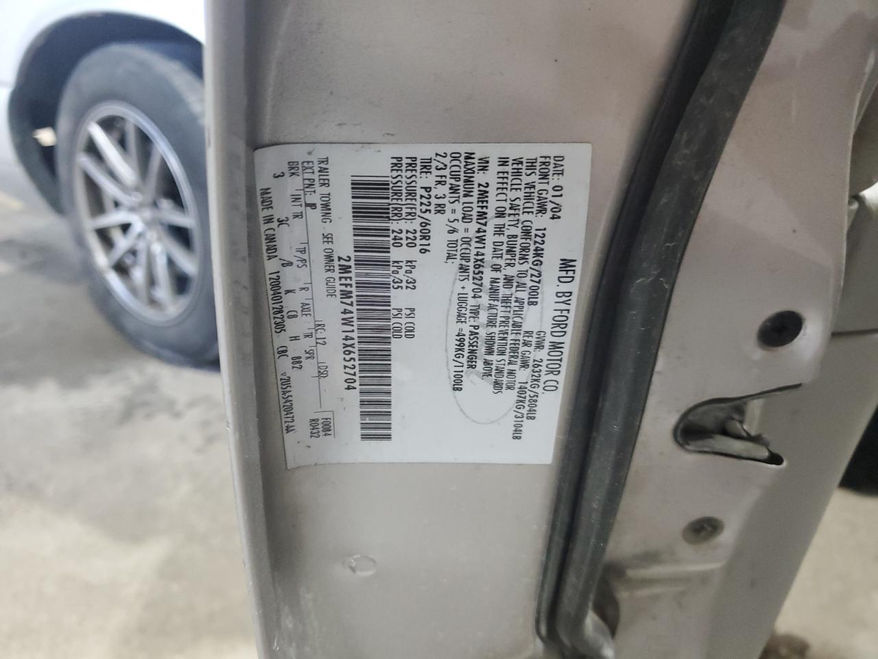 2004 Mercury Grand Marquis Gs VIN: 2MEFM74W14X652704 Lot: 69725195