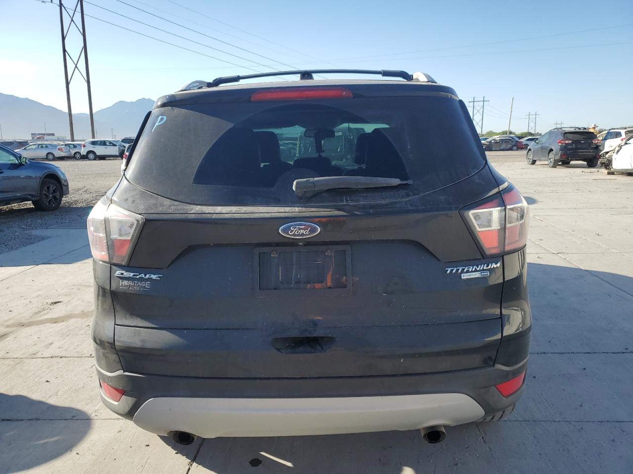 2017 Ford Escape Titanium VIN: 1FMCU9J91HUA78614 Lot: 68865205