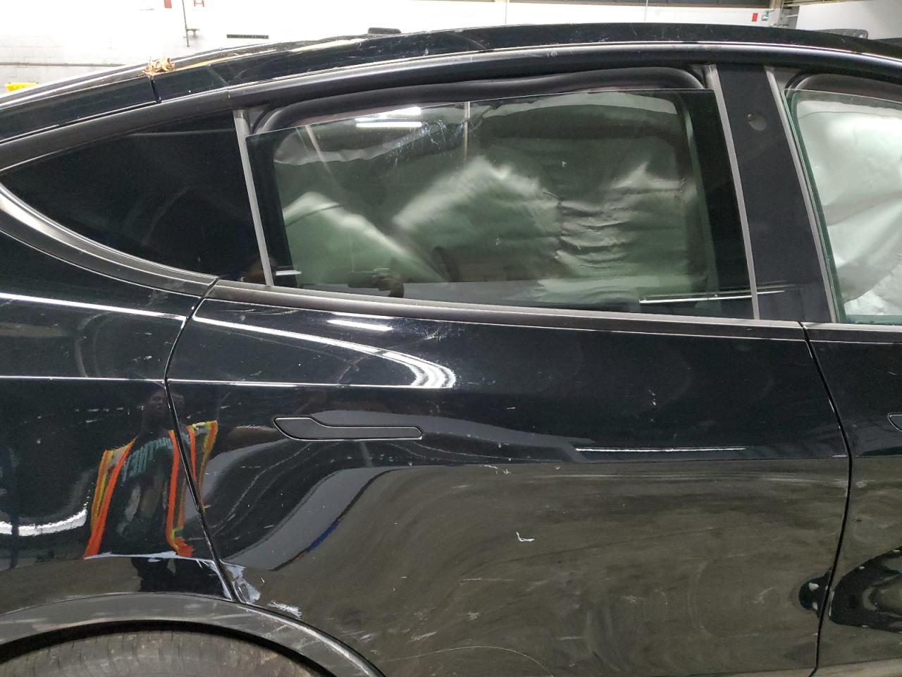 2023 Tesla Model Y VIN: 7SAYGDEE1PF694769 Lot: 68747105